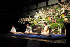 Some ladies playing these cool old instruments